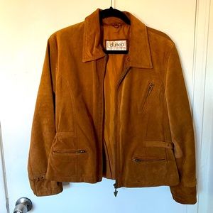 d’linea collection jacket. Outer shell of jacket is genuine leather.